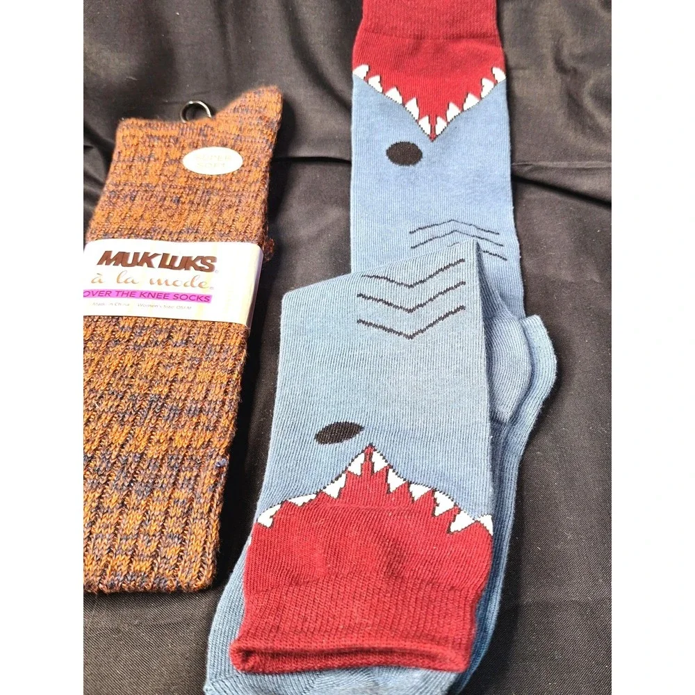 Women's one pair‎ of Mukluks Over the knee socks and on pair of Shark bite socks